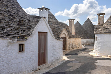 View of traditional trulli houses in Alberobello, Puglia, Italy, Bari region.