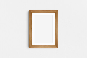 Frame mockup 5x7, 50x70, A4, A3, A2, A1. Single cherry wood frame mockup. Clean, modern, minimalist, bright. Portrait. Vertical. Passepartout/mat opening in 2:3 aspect ratio.