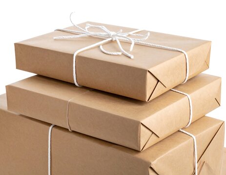 Close-up of three stacked brown packages tied with white string, against a plain white background, appearing prepared