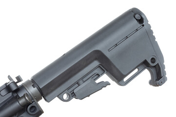 Installed AR-15 buttstock with rubber recoil pad and storage underneath.