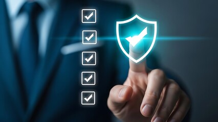 Businessman activating digital shield with checkmarks for cybersecurity and data protection