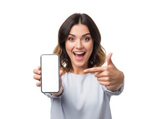 Fototapeta premium Excited woman pointing at a blank smartphone screen, isolated on white background.