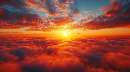 Fototapeta premium A vibrant sunrise illuminates a large expanse of clouds, showcasing atmospheric light and color.