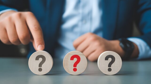 Question marks symbol on wooden block for FAQ. Problem and solution. Quiz, test, survey, support, knowledge, decision. 