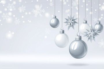 Silver Christmas ornaments hanging against a soft white background, with copy space for design