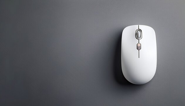 top view of a modern white wireless computer mouse minimalist technology device on a gray background with copy space