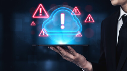 Red alert triangles over a blue cloud icon, symbolizing cloud security threats, system warnings, and data protection risks in digital environments Parse