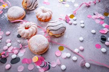 Colorful donuts, berliner and pastries for party and carnival