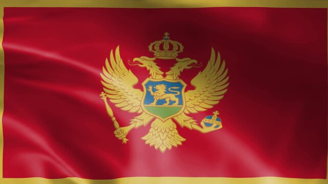 montenegro national flag waving fabric texture with golden coat of arms symbol and red background