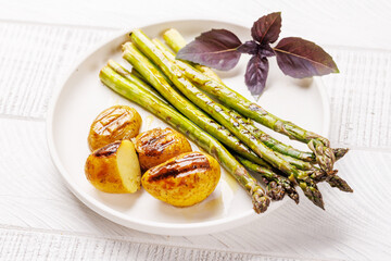 Grilled asparagus and golden baby potatoes