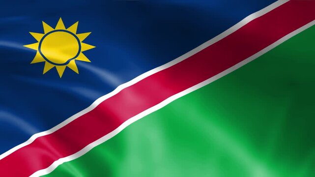 namibia national flag waving fabric texture with blue red green colors and golden sun emblem designs