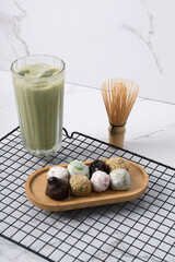 Mochi with various flavors with matcha drink, traditional food in Bandung, Indonesia