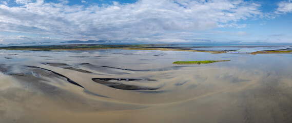 panorama landscape view of the Hopsvatn Lake and river delta in northern Iceland near Siglufjordur