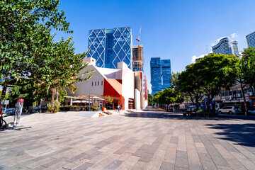 People in city square with futuristic architecture in Tel Aviv, Middle East. Contemporary architecture in modern Israel. © Tomasz
