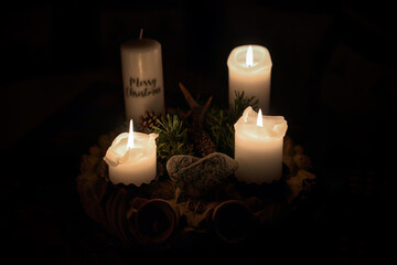 a beautiful handmade carved wooden advent wreath with christmas decoration