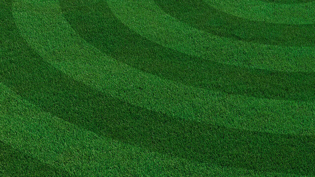 Green grass texture background. A perfectly manicured Sports field / Pitch / Garden Lawn wallpaper with circular stripes.