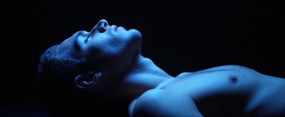 The medium shot of belly rising and falling shows calm and peaceful breathing.