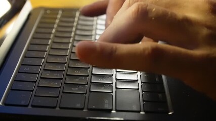 Close up of a person's hands opening a laptop lid and starting to type on the keyboard on a wooden desk in a home office, symbolizing remote work, digital communication, and productivity - Powered by Adobe