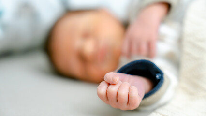 Newborn peacefully sleeping at home