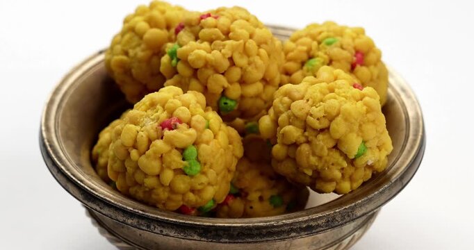 indian sweet motichoor laddoo&nbsp;or Bundi laddu made of gram flour very small balls or boondis which are deep fried and soaked in sugar syrup before making balls
