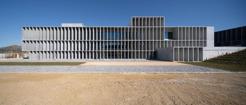 Brutalist concrete building on university campus