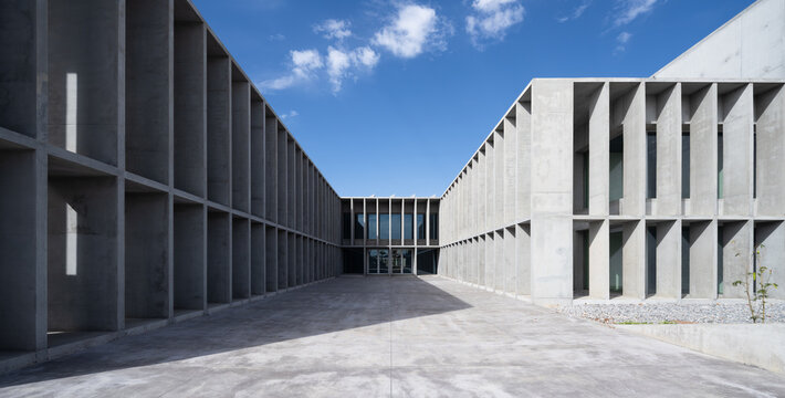 Brutalist concrete building on university campus