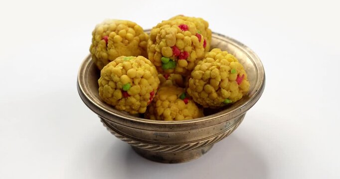 indian sweet motichoor laddoo&nbsp;or Bundi laddu made of gram flour very small balls or boondis which are deep fried and soaked in sugar syrup before making balls