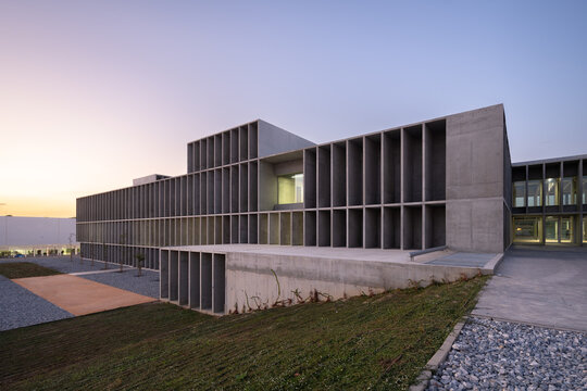 Brutalist university campus with concrete facade