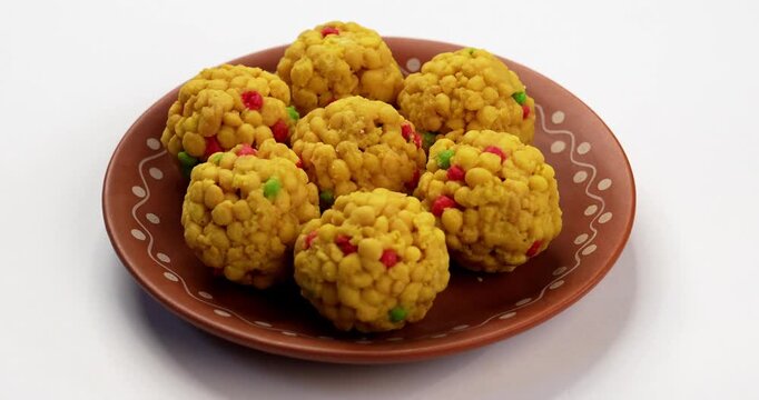 indian sweet motichoor laddoo&nbsp;or Bundi laddu made of gram flour very small balls or boondis which are deep fried and soaked in sugar syrup before making balls