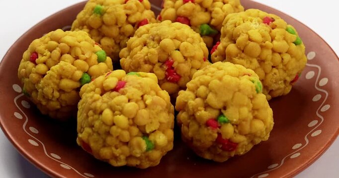 indian sweet motichoor laddoo&nbsp;or Bundi laddu made of gram flour very small balls or boondis which are deep fried and soaked in sugar syrup before making balls