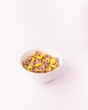 Colorful cereal bowl on white minimalist background