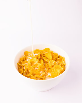 Cereal bowl breakfast with milk on white background