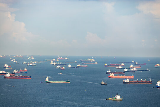 Maritime vessels anchored off the coast of Singapore