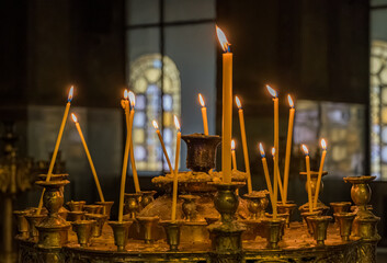 Lit candles in an Orthodox church in Bulgaria