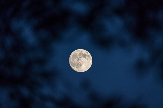 Moonrise over Tibidabo with dark night sky