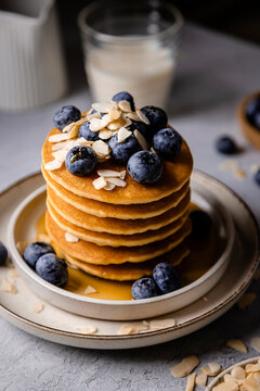 Stack of pancakes with blueberries and almonds