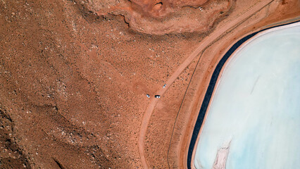 A large body of water with a blue section in the middle