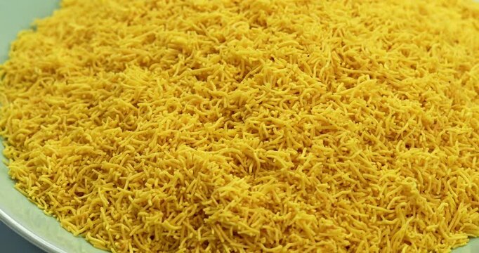 Besan Sev or Indian Namkeen Noodles of chickpea flour. Popular Gujarati&nbsp;Deep fried Teatime Snack.
