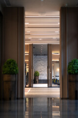 Polished corridor leads to gym area