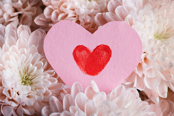 Pink heart paper with red print on flowers
