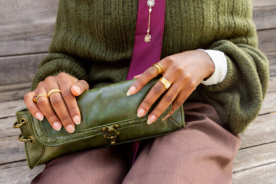 Gen Z woman displaying chic fashion accessories