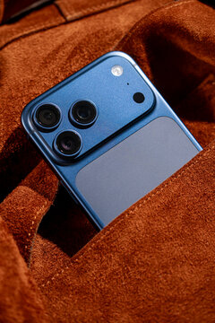 Sleek smartphone in a pocket emphasizes modern convenience