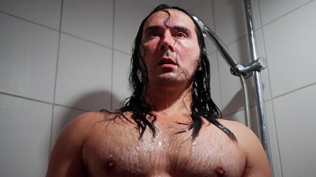 Actor In Shower, Male Performer With Wet Hair, Caucasian Actor Shows Intense Emotions Under Water, Actor In Bathroom Demonstrates Raw Emotional Vulnerability With Cinematic Lighting