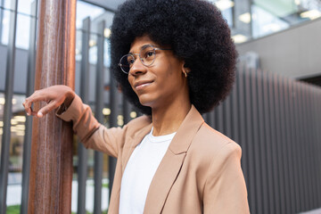 Portrait of person in a stylish brown blazer