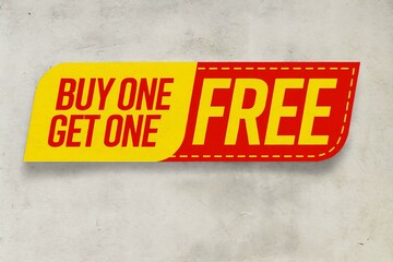 A vibrant buy one get one free promotion banner in yellow and red on a textured wall