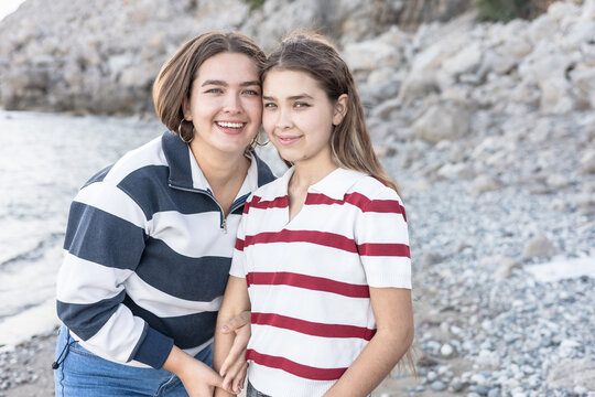 Sisters enjoying a sunny day at the beach