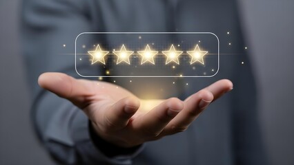 Hand holding digital five-star rating interface
