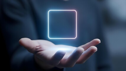 Hand holding holographic square technology interface