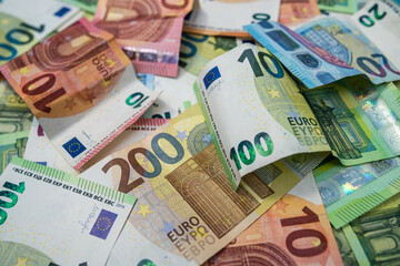 Euro banknotes background, concept of wealth, finance, investment and European economic stability