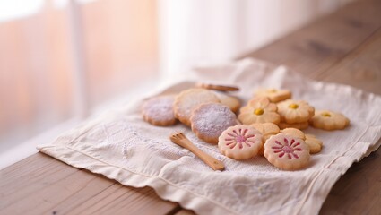 Soft Sugar Cookies on Light Fabric Background